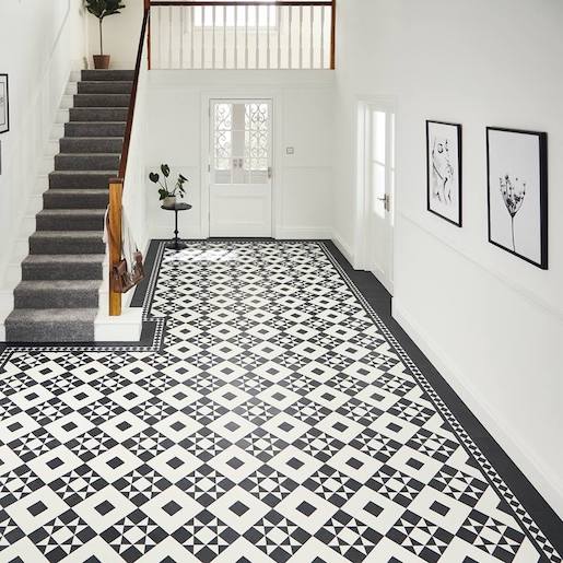 A hall way in Victorian style geometric tradition look LVT tiles